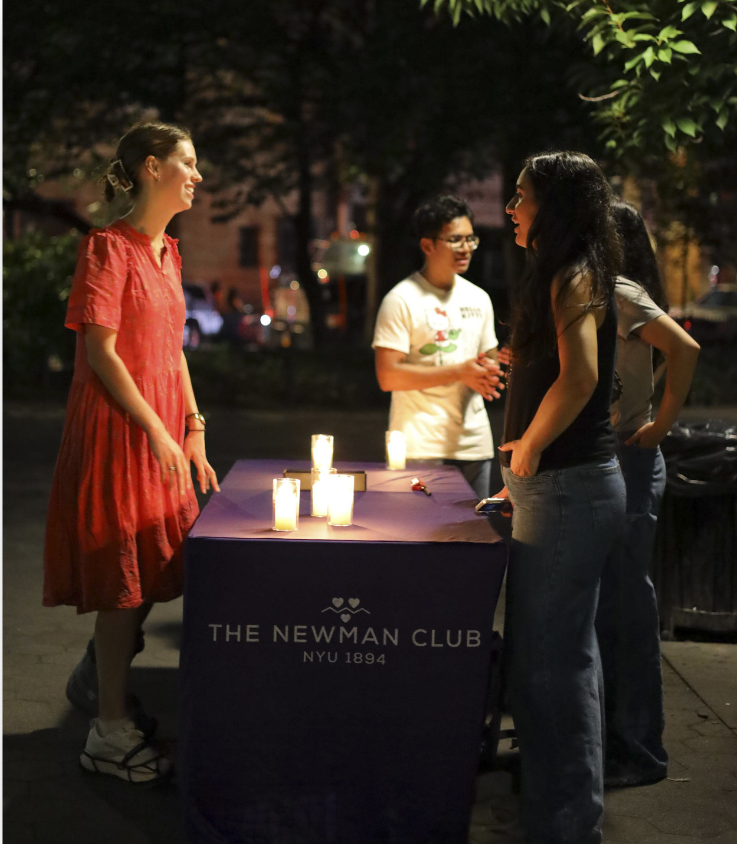Students from the Newman Club NYU 1894 participating in an outdoor event